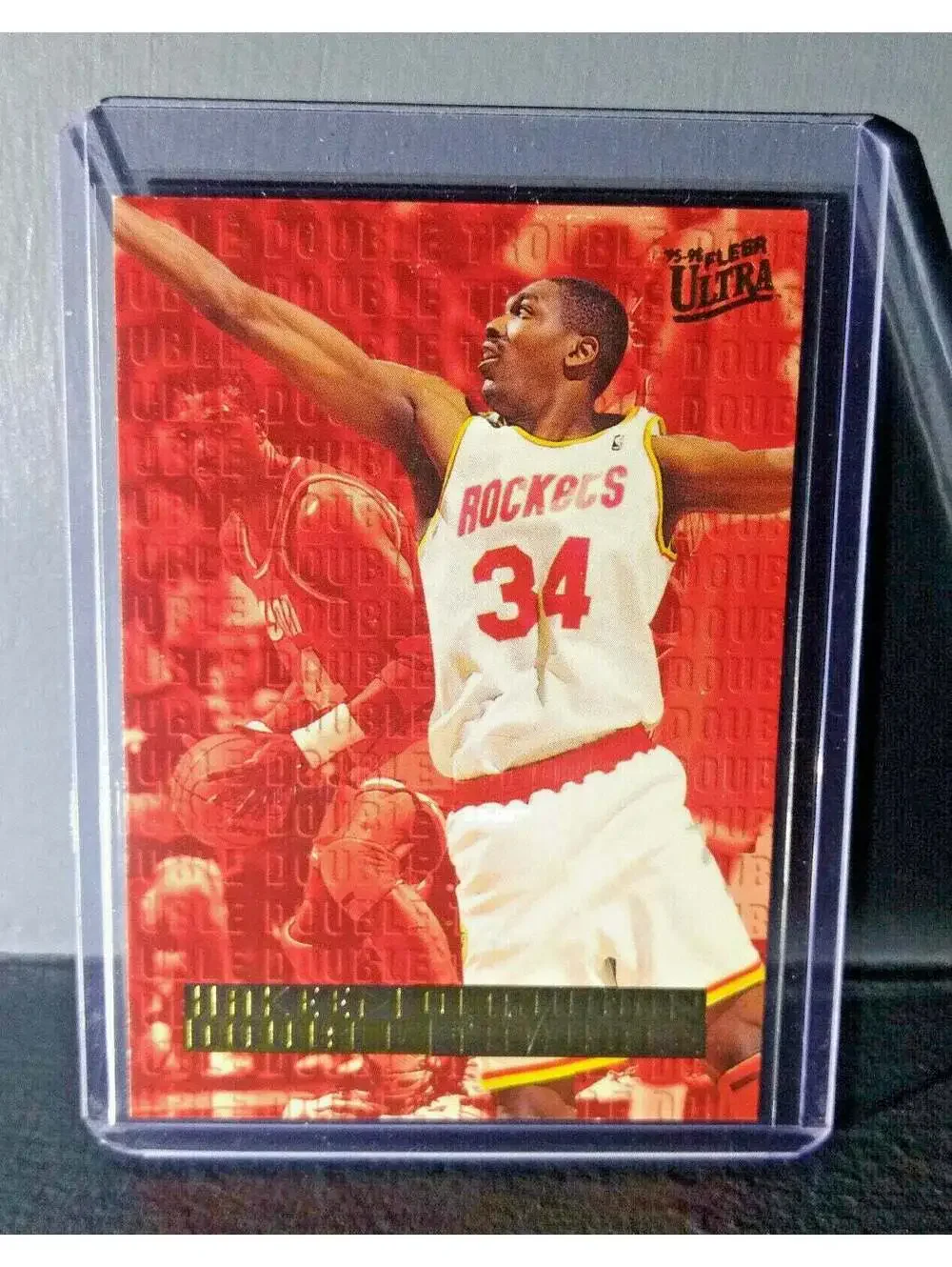 1995-96 Hakeem Olajuwon Fleer Ultra Double Trouble #5 Basketball Card